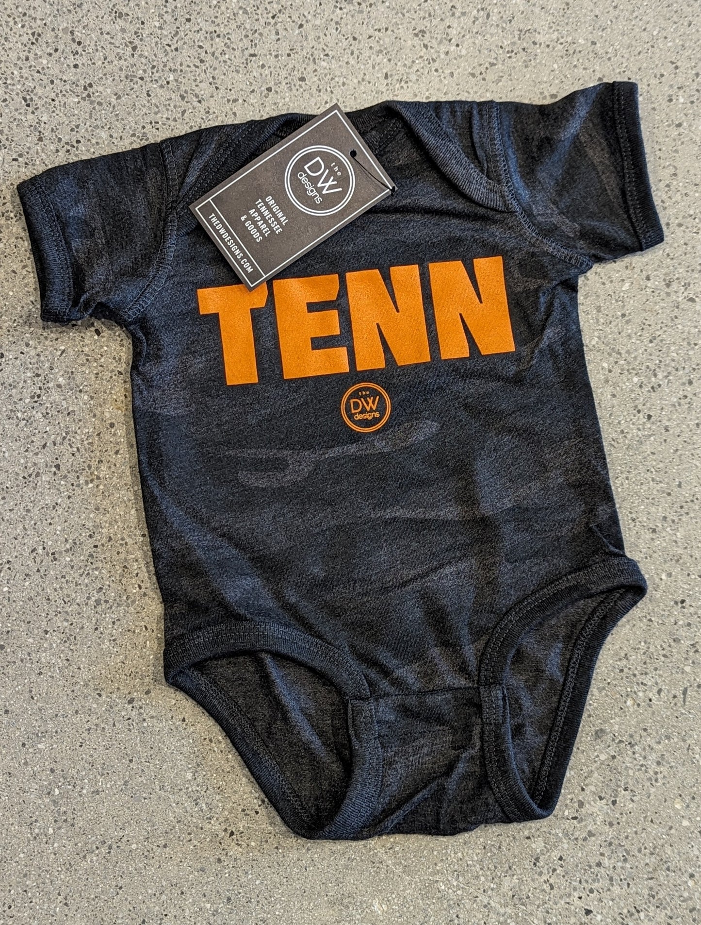 The TENN Black Camo Onesie