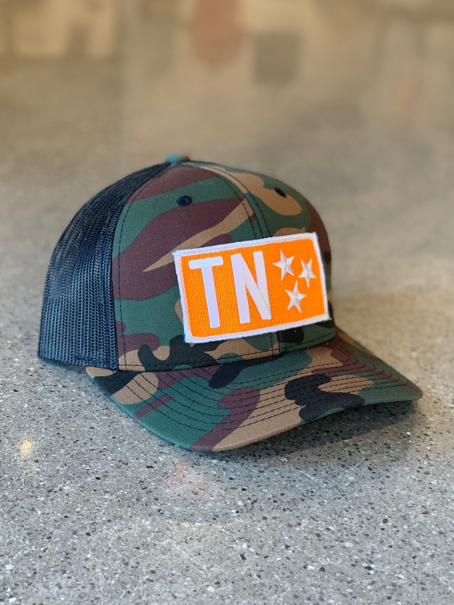 The TN Stars Gameday Trucker Hat - Camo - PRE-ORDER