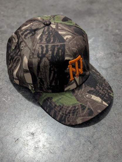The TN Interlock 5 Panel Wood Camo Hat
