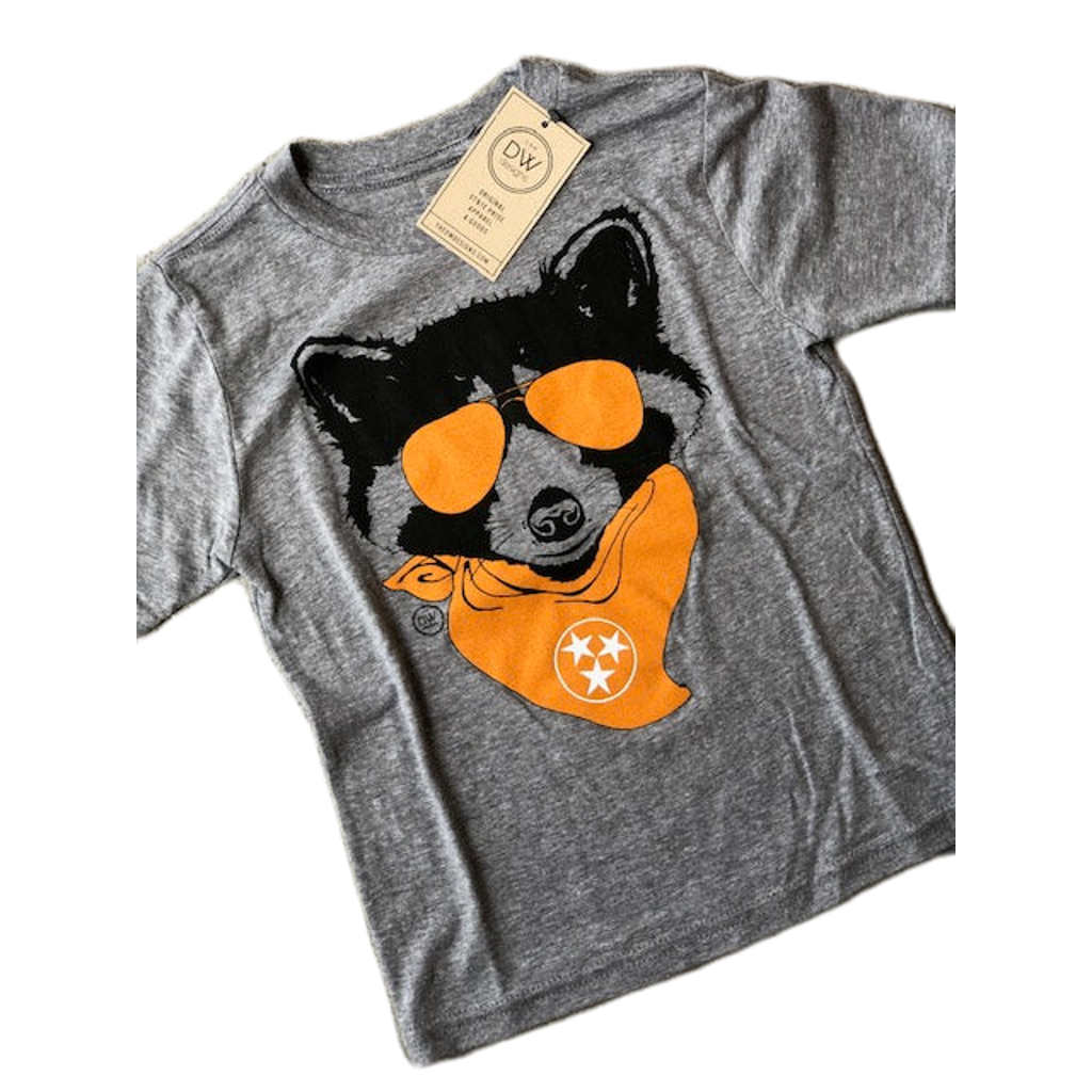 The Lil' Rascal Kids Tee features a dog wearing sunglasses and a tristar bandana. Sold by The DW Designs, Knoxville, TN.