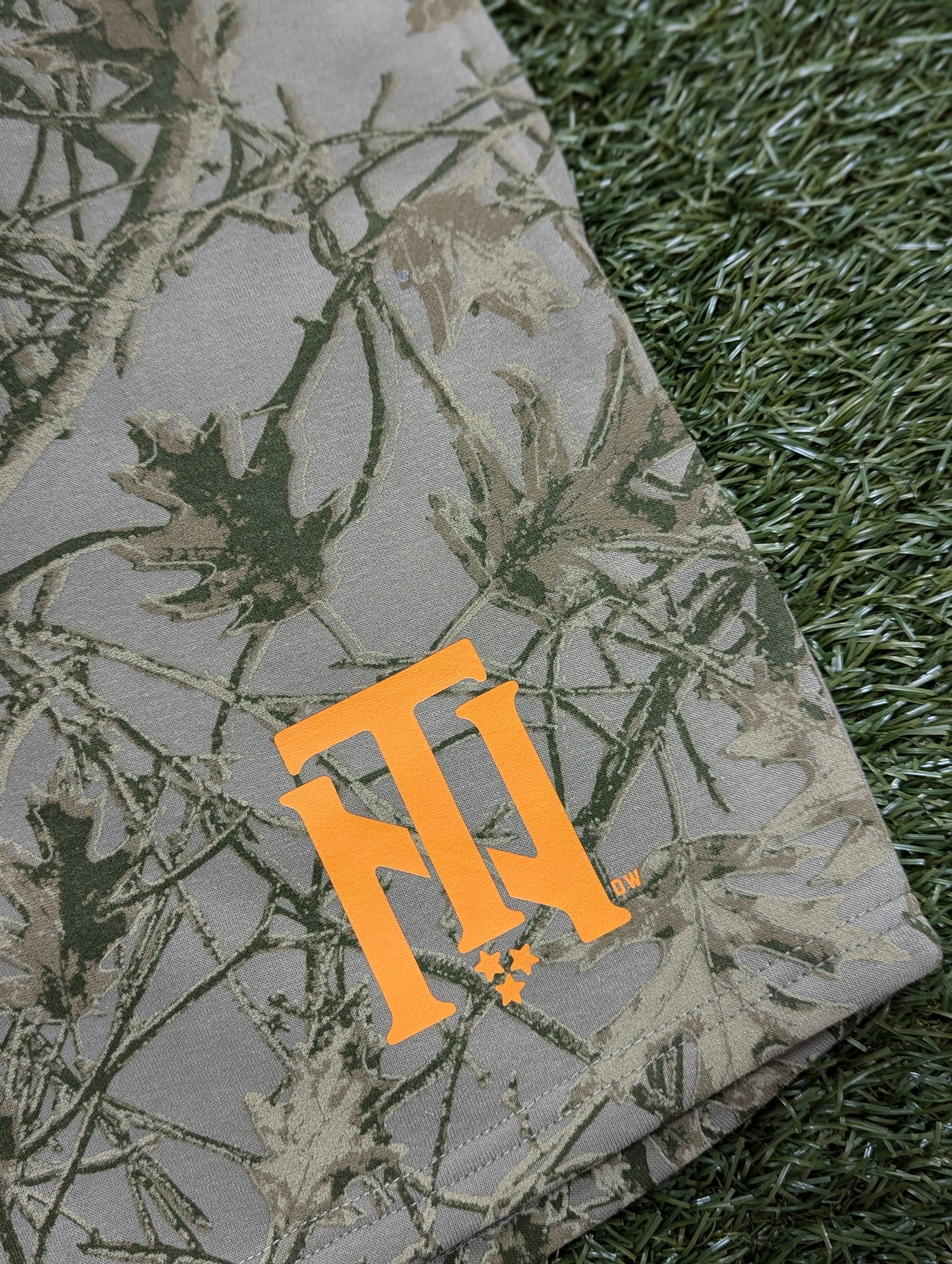 The TN Interlock Real Tree Camo Fleece Shorts