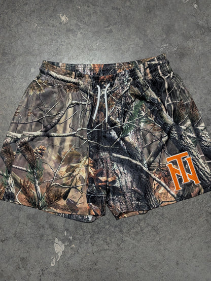 The TN Interlock Tree Camo Mesh Shorts